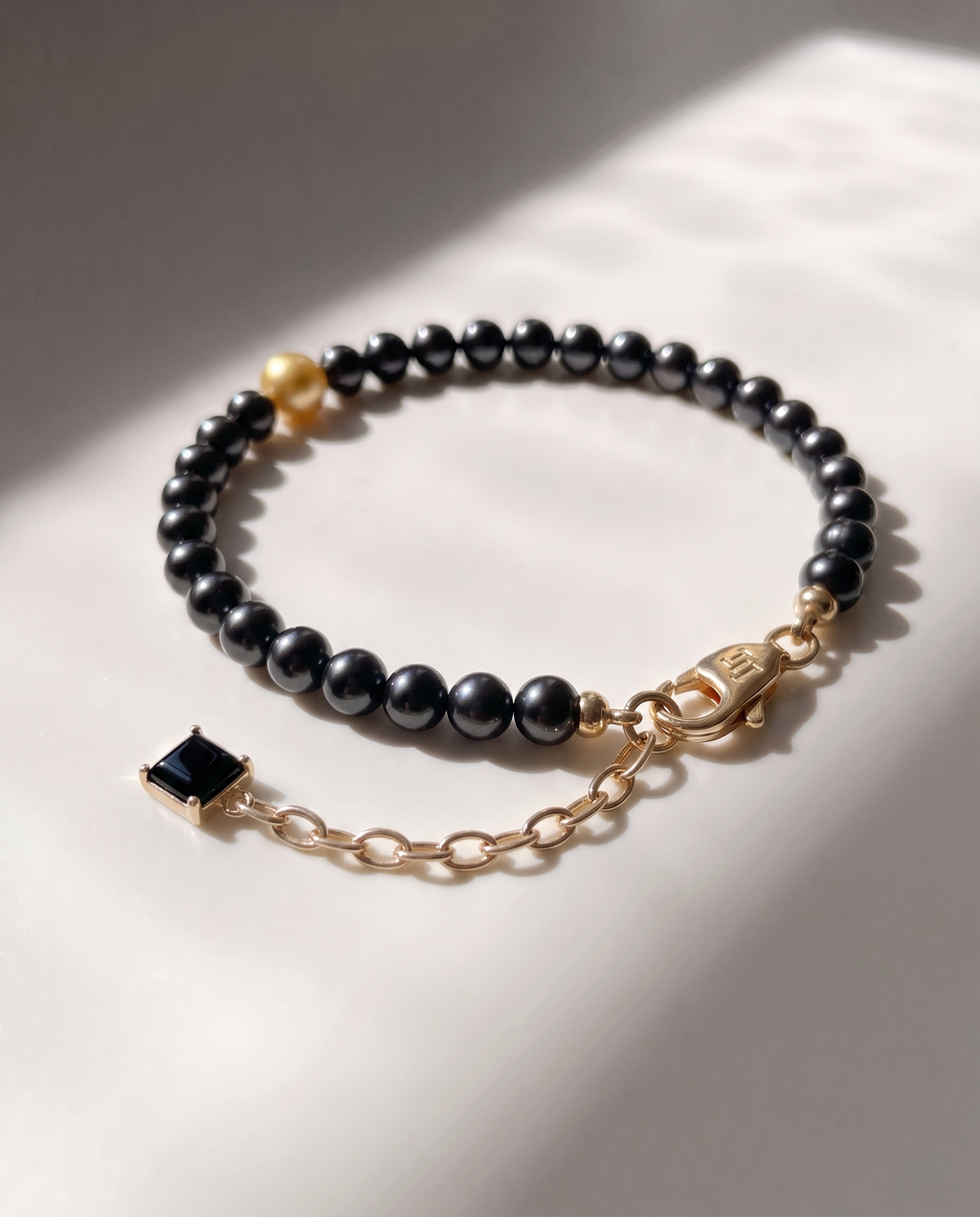 Caesura Black & Gold Pearl Bracelet