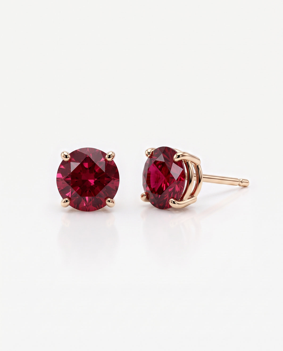 Round Ruby Solitaire Ear Studs in 9ct rose gold