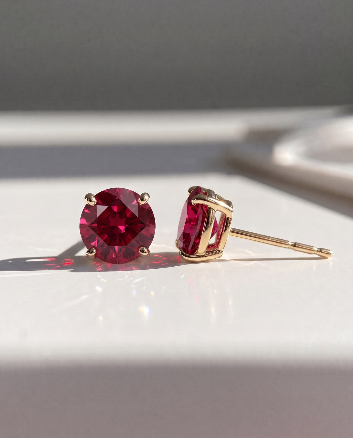 Round Ruby Solitaire Ear Studs in 9ct yellow gold
