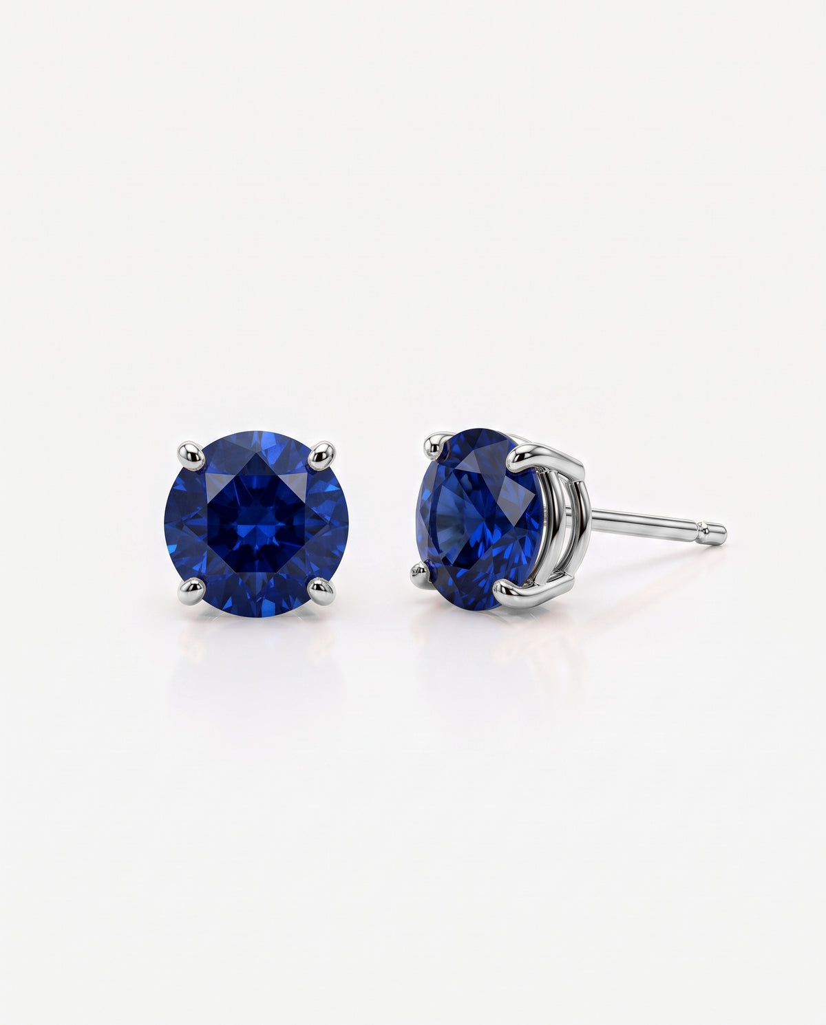 Round Sapphire Solitaire Ear Studs in 9ct white gold