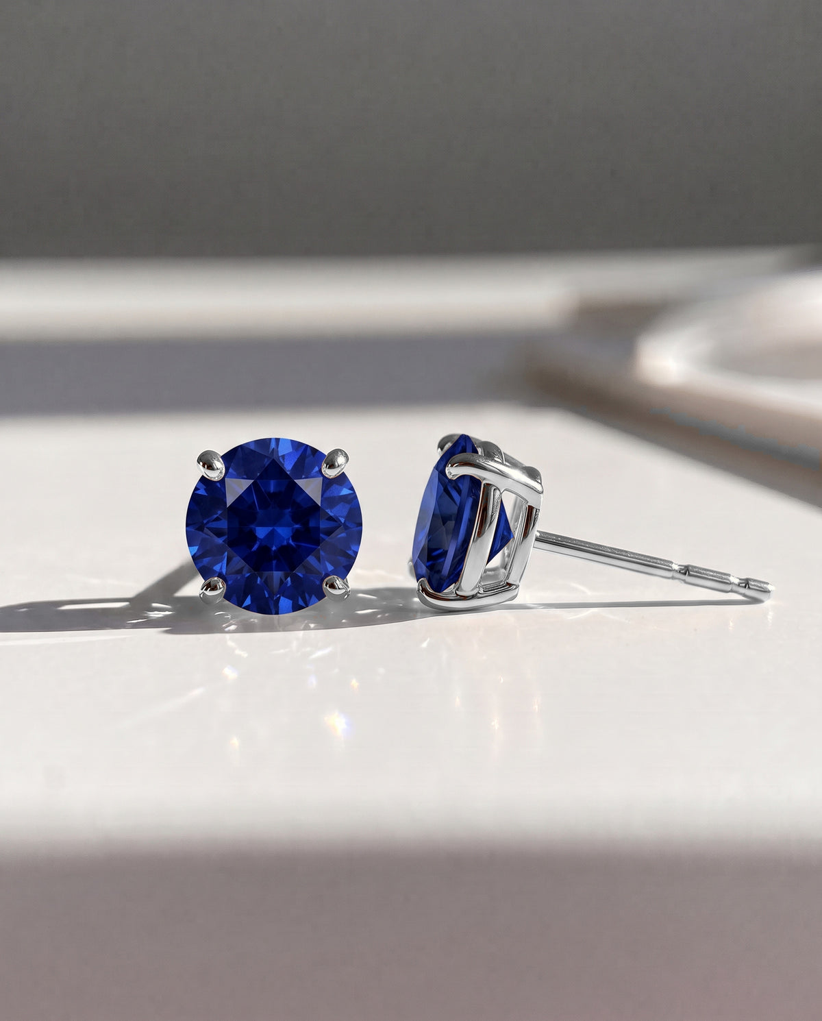 Round Sapphire Solitaire Ear Studs in 9ct white gold